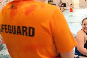 Person in a lifeguard t-shirt