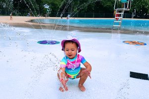 Child in Kiwanis outdoor pool